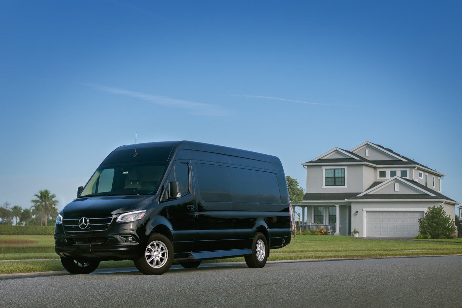 CREDIT HOME mobile real estate office parked in front of a Florida home